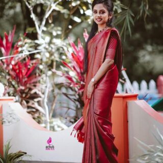 Energetic Maroon Banarasi Silk Saree With Gleaming Blouse Piece