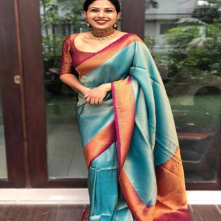 A glam Rama Soft Silk Saree with Beauteous Blouse Piece